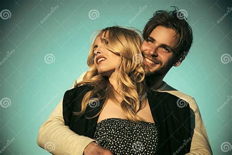 Sensual Young Couple Making Love In Bedroom Couple In Love On Blue Sky Background Stock Image