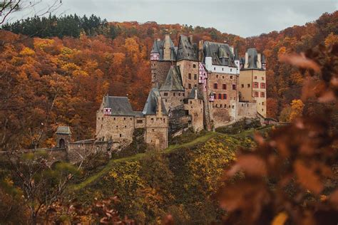 Burg Eltz Brown Castle With Grey Roof On Mountain During Daytime