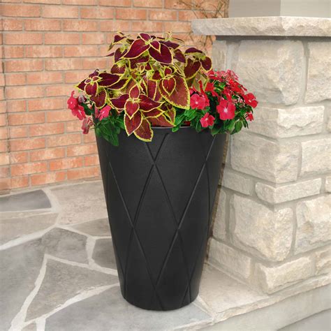 Bring elegance and grandeur to your outdoor or indoor entrance, threshold or courtyard with our large versailles planter. Versailles Tall Planter 26" | USA Exterior