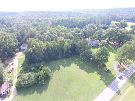 In the conversion tables below, figures are rounded to a maximum of 5 decimal places (7 with smaller numbers) to give approximations. 3000 Sq. Ft. Building on 5 Acres - Alabama Land Agent