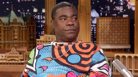 Download Tracy Morgan Smiling At An Event Wallpaper