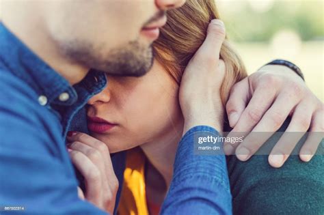 Young Man Comforting His Girlfriend High Res Stock Photo Getty Images