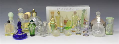 A Set Of Five Salvador Dali Dali Collection Miniature Perfume Bottles