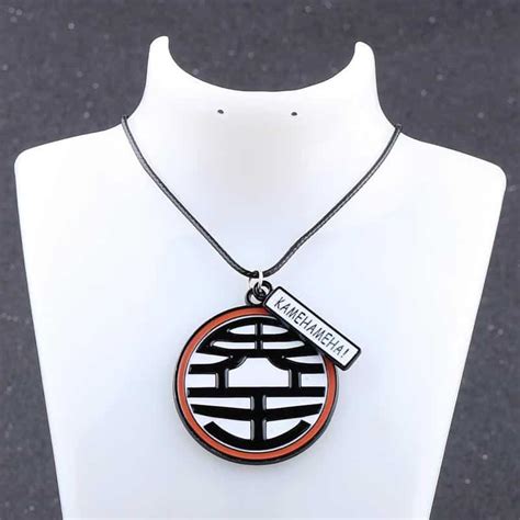 It was also explained how elder kai was tricked into wearing the earring with an old witch and becoming ugly and old. Dragon Ball Z King Kai Kanji Symbol Jewelry Necklace