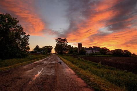 Country Road After The Rain At Sunset Photograph By Janice Adomeit