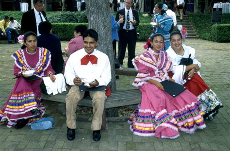 [unidentified people in traditional mexican dress at city hall] side 1 of 1 the portal to