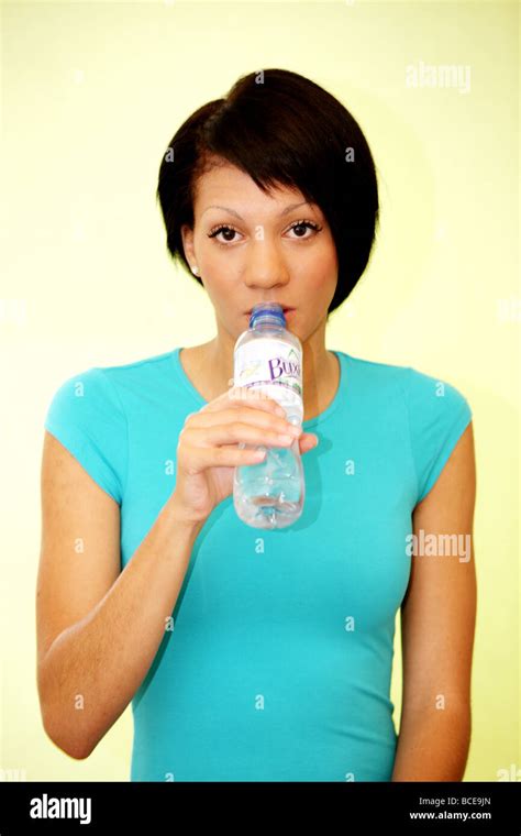 Young Woman Drinking Mineral Water Model Released Stock Photo Alamy