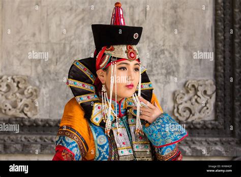 Young Mongolian Woman In A Traditional 13th Century Costume In A Temple