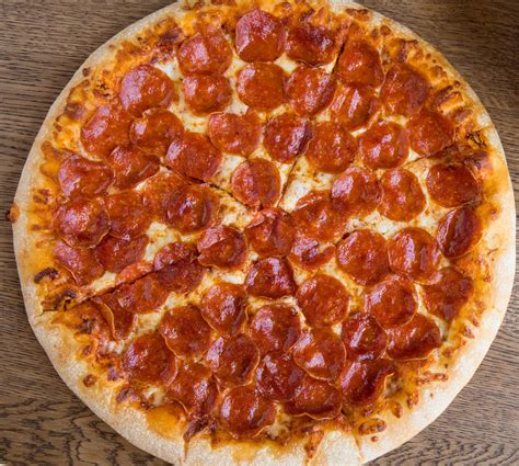 The Top 10 Pizza Toppings Ranked From Pepperoni To Ham