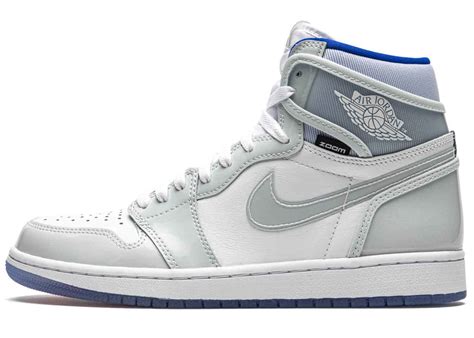 The upper of the air jordan 1 high university blue is composed of a white and black tumbled leather upper with university blue durabuck overlays. Nike Air Jordan 1 High Zoom Racer Blue