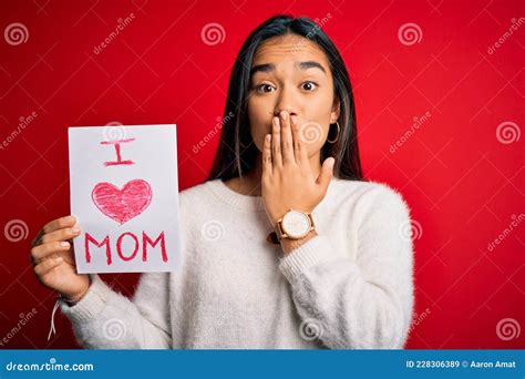 Young Beautiful Woman Holding Paper With Love Mom Message Celebrating Mothers Day Cover Mouth