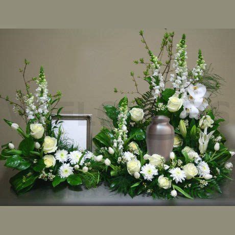 Suitable for mobile apps, web apps and print media. Cremation urn flowers sympathy | Funeral flower ...