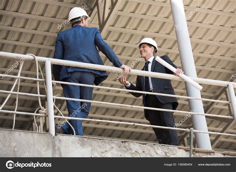 Contractors Talking On Construction Site — Stock Photo