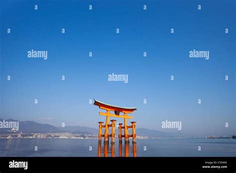 Reflection Of Torii Gate In Water Itsukushima Shrine Miyajima