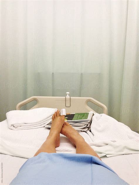 Woman S Feet On Hospital Bed By Stocksy Contributor Alita Stocksy