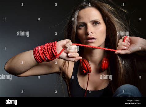 Beautiful Young Woman Tied With The Red Rope Stock Photo Alamy