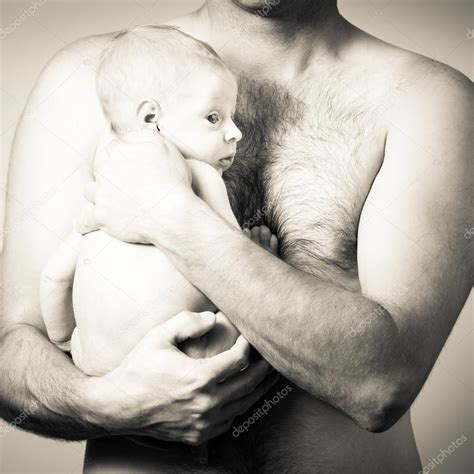 Dad Holding Newborn Baby Stock Photo By Thpstock