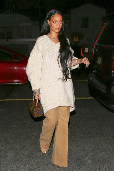 rihanna s wears cozy oversize sweater and flare trousers in l a