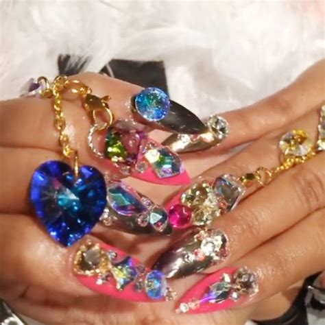Cardi b pink jewels, nail art, stones, studs nails | steal her style. Cardi B's Nail Polish & Nail Art | Steal Her Style