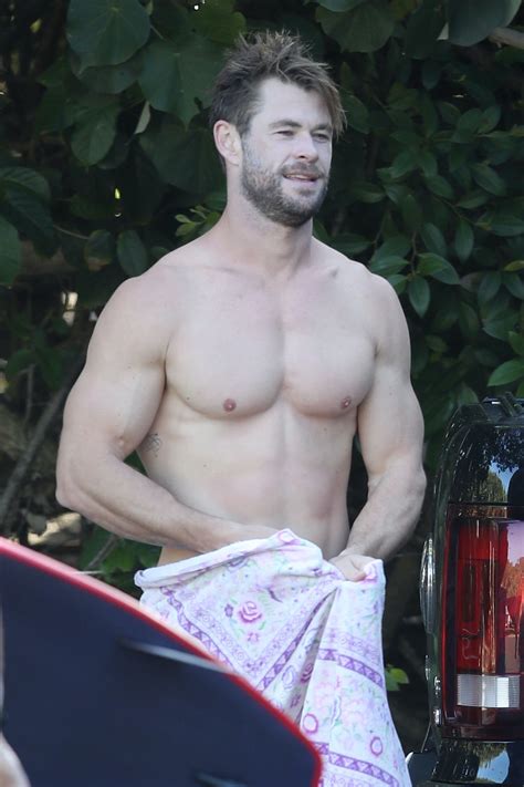 Look At These Pics Of Chris Hemsworth And His Muscles To Ease Your Mind