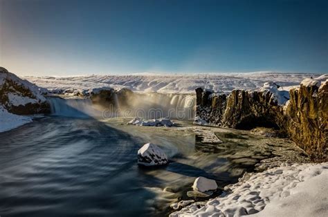 Godafoss Water Fall In Iceland During Winter Snow Frozen Blue Sk Stock