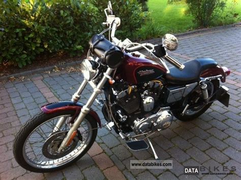 Vivid black with red logo on tank. 2000 Harley Davidson Sportster XL 1200 Custom / REDUCED