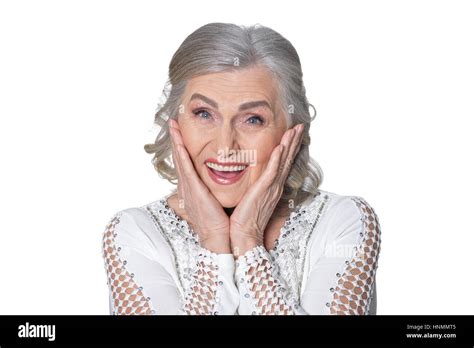 Senior Woman With Hands On Cheeks Stock Photo Alamy