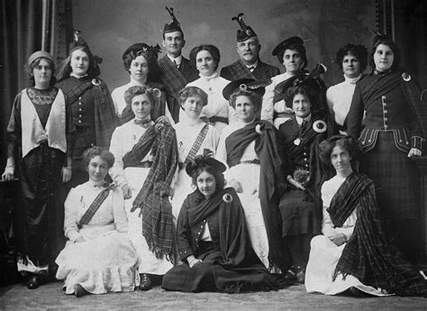 A Group Of Women In Highland Costumes Most Wear White