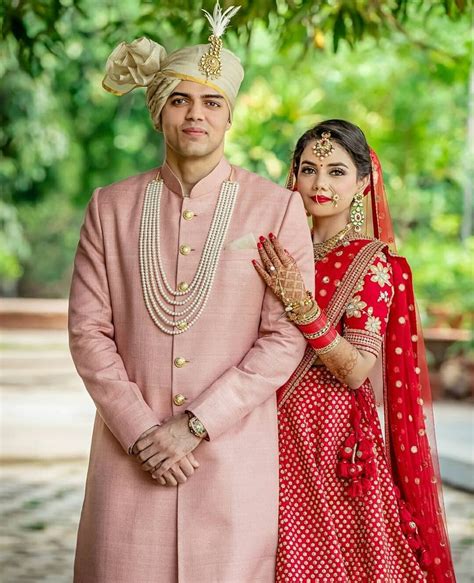 image may contain 2 people people standing indian wedding photography couples wedding
