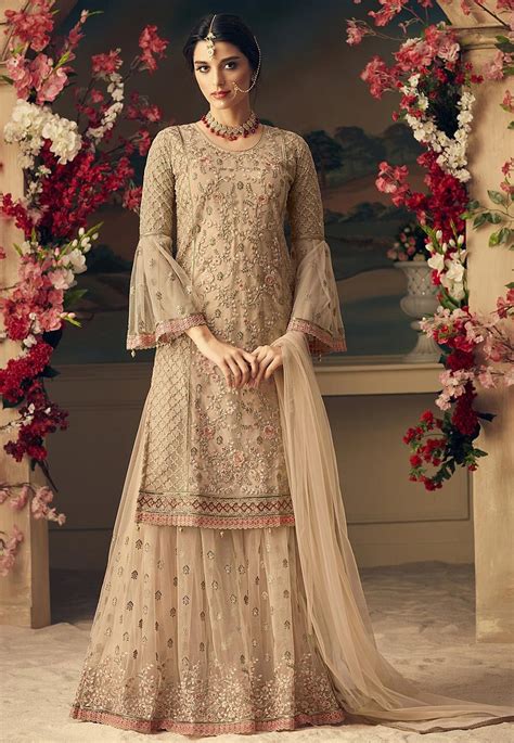 Hello ○national customers what's app +917222002224 ○international customers what's app +00919950004443 book your order we collaborates with designers alzawiah is a worldwide web store. Embroidered Net Pakistani Suit in Beige | Indian outfits ...