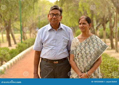Happy Looking Retired Senior Indian Man And Woman Couple Smiling And