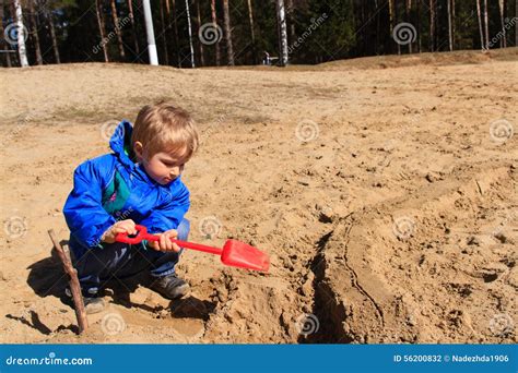 Little Boy Digging Sand In Spring Stock Photo Image Of Autumn