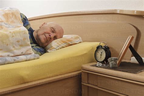 Old Man Sleeping Stock Photo