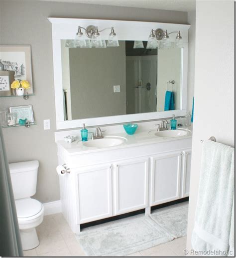Also, a unique view of the tile frame makes this diy mirror project make your bathroom look very well on decorating. Framing A Large Bathroom Mirror | DIY