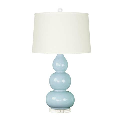 Available in soft neutral hues, this lamp glows with contemporary style next to a bed or sofa. Light Blue: American Ceramic: Clear Acrylic Finial and ...