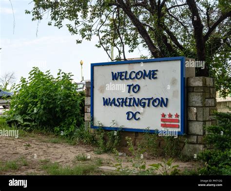 Welcome To Washington Dc Sign Leading To Key Bridge On The Way To