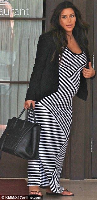Pregnant Kim Kardashian Swaps Curve Hugging For Comfort In Striped Maxi Dress Daily Mail Online