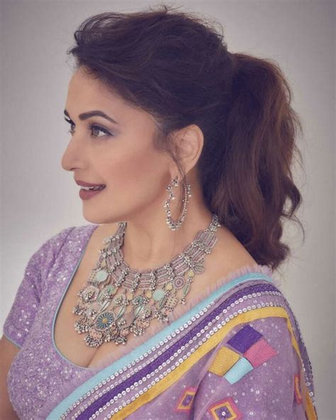 Madhuri Dixit Is A Treat For Our Eyes In A Purple Phulkari Lehenga For