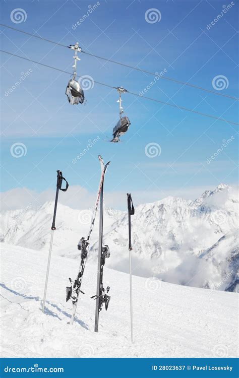 Pair Of Ski And Poles Stick Out Of Snow Stock Image Image Of Peak