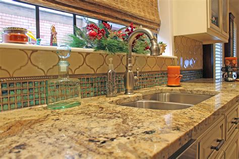 What are the shipping options for turquoise tile? Traditional #kitchen. Backsplash with turquoise 1x1 glass ...