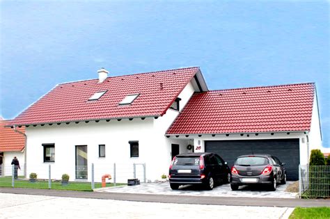 Haus mit garage unter einem dach und separat stehender garage. Haus mit Garage bauen | Fertighaus.de