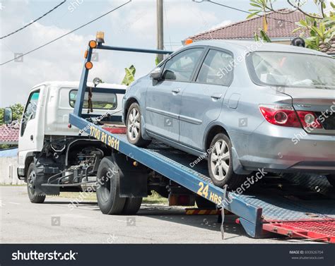 Towe Truck Pulling Car Images Stock Photos And Vectors Shutterstock