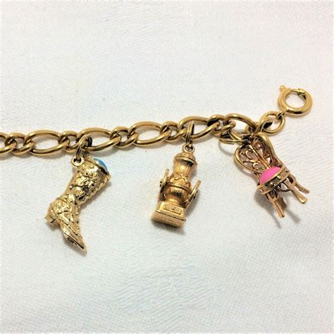 Vintage Avon Charm Bracelet With 7 Charms Including Boots Etsy