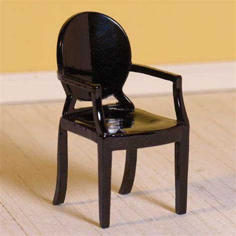 Philippe starck's louis ghost is an inexpensive, stackable, plastic chair. The Dolls House Emporium Black Ghost Chair