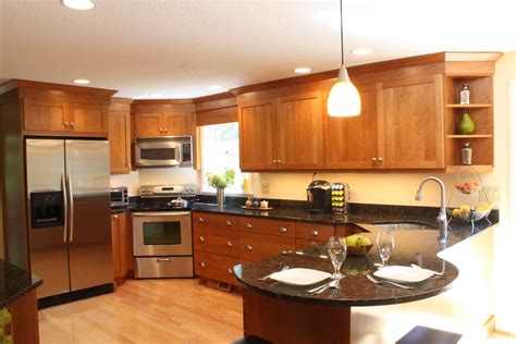 Want to update wood kitchen cabinets, a vanity, trim or wood flooring with a cherry, red or pink undertone or stain? Cherry Wood Cabinet Kitchen- Stainless steel appliances ...