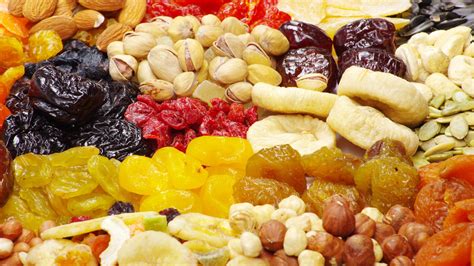 Download Wallpaper 1920x1080 heap, dried fruit, candied fruit, nuts Full HD 1080p HD Background