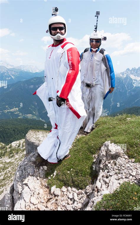 These Two Base Jumpers Are Getting Ready To Exit From A Cliff Just A