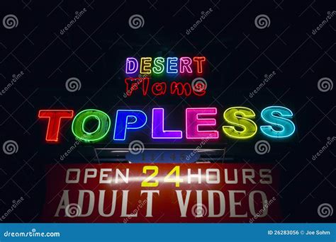 topless neon sign advertising a strip club editorial photo image of signs color 26283056