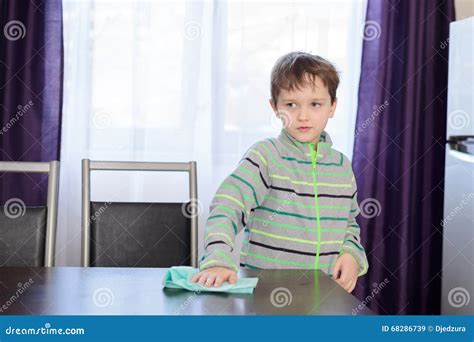 Boy Cleaning Table In Kitchen Stock Image Image Of Clean