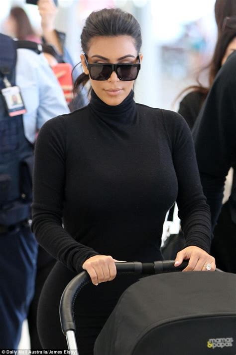 Kim Kardashian Shows Off Famous Curves In Sheer Turtleneck Dress Daily Mail Online